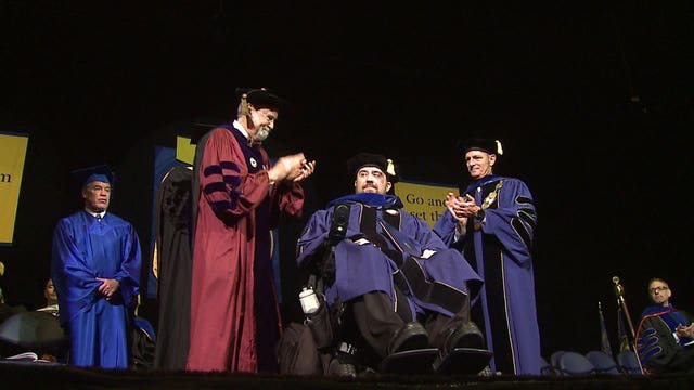 "Resilient:" Talented, scouted soccer player, paralyzed in 1999, receives Ph.D. from Marquette