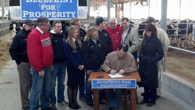 Gov. Walker signs tax cut bill which eases property tax burden