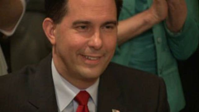 Walker signs law making big changes to Milwaukee Co. Board