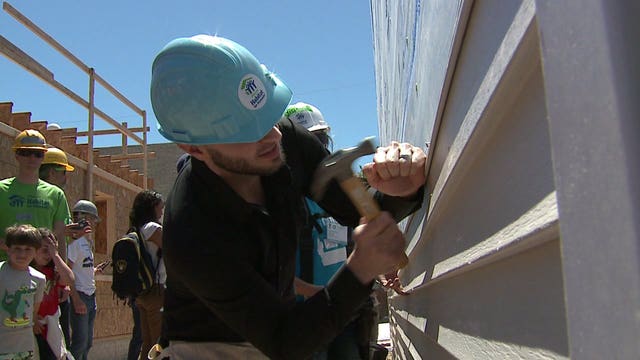 "Positive impact:" Brewers' Braun and Garza help build for Habitat for Humanity