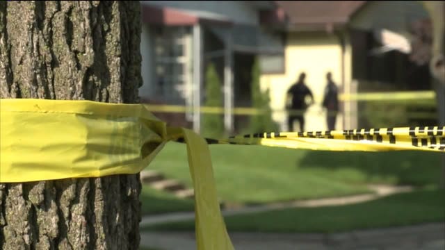 "Not on this block:" Woman's body found inside home as police searched for child abuse suspect
