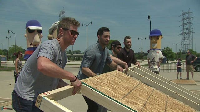 "Phenomenal job:" Brewers put down the bats and pick up hammers to help Habitat for Humanity