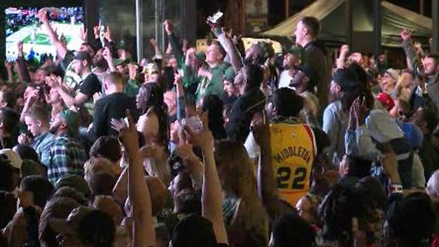 'Everybody is excited:' Large crowd cheers on the Bucks outside Fiserv Forum during Game 1
