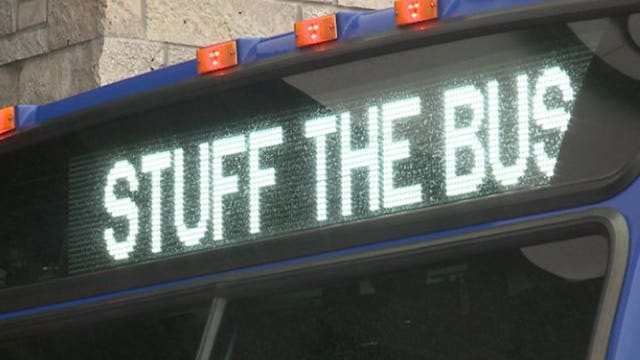 'Important to give back:' Thousands of food items collected during 'Stuff the Bus' drive