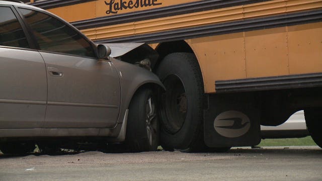 Police: Three people, including a student, taken to hospital after crash involving school bus, car