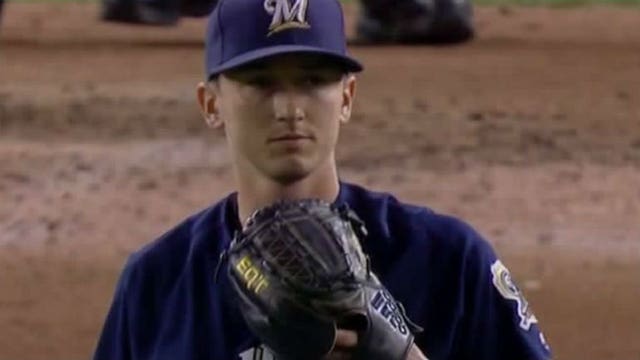 Davies, power bats launch Brewers over Nationals 8-0