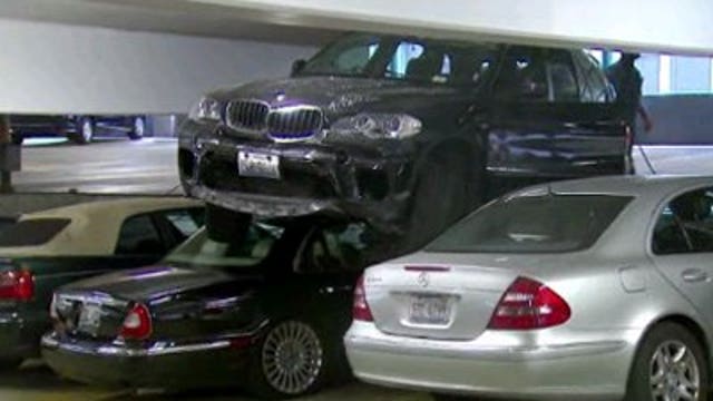 Luxury car pileup inside a Chicago parking garage