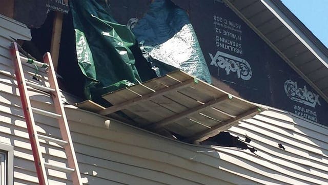 "We think that's a sign:" Kenosha home has major wind damage but one item remains untouched