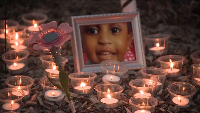 'An innocent child:' Strangers gather for vigil honoring 2-year-old Noelani Robinson