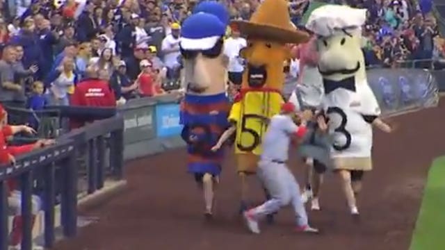 Pay attention! Reds infielder nearly taken out by The Famous Racing Sausages