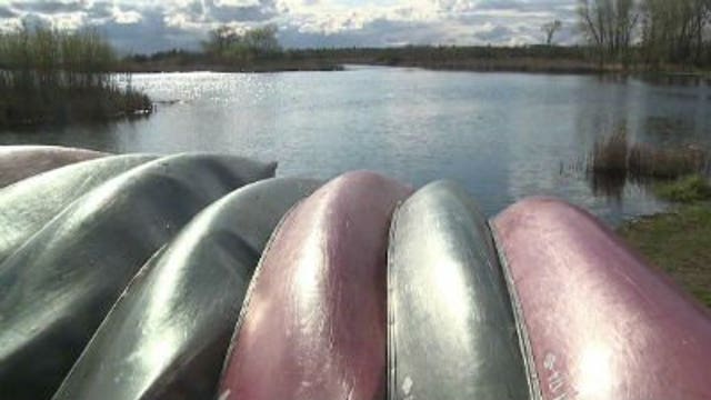 WATER RESCUE: Students canoeing in Sheboygan Marsh pulled to shore