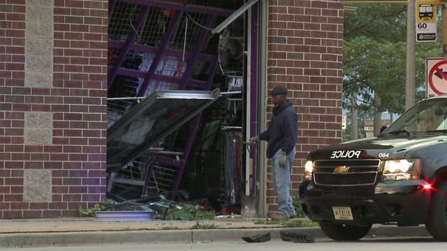 Vehicle, believed stolen, crashes into beauty shop near Fond du Lac & Burleigh