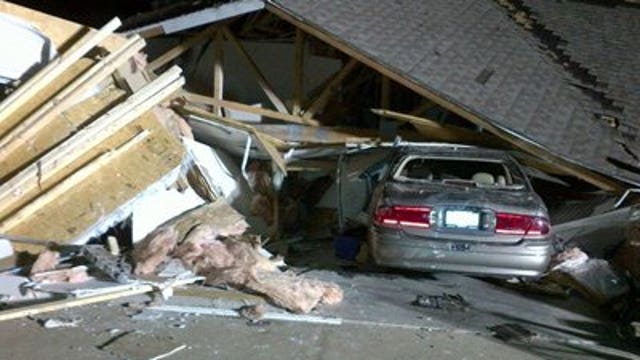 Massive storm system weakens after 12 deaths