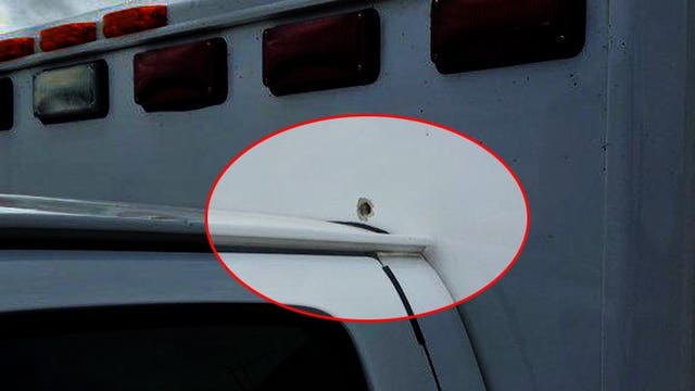"Something hit the ambulance:" Rig struck by gunfire leaves workers on edge