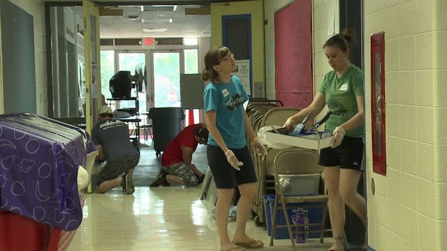 Volunteers team up at Hoover Elementary School to fulfill principal's dream