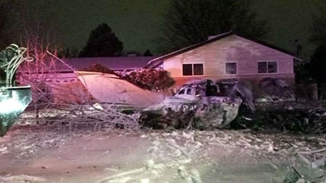 Pilot killed when small plane crashes in front yard of suburban Denver home
