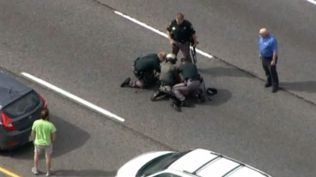 WATCH: DRAMATIC VIDEO out of Colorado shows apprehension of armed carjacking suspect on the interstate