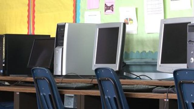 MPS, police union donate computers to school in need