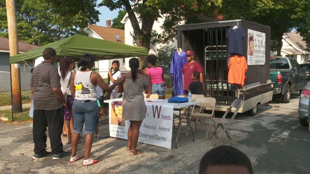 Murder victim's family hosts block party with 'Cell on Wheels,' giving youth a glimpse of life in jail