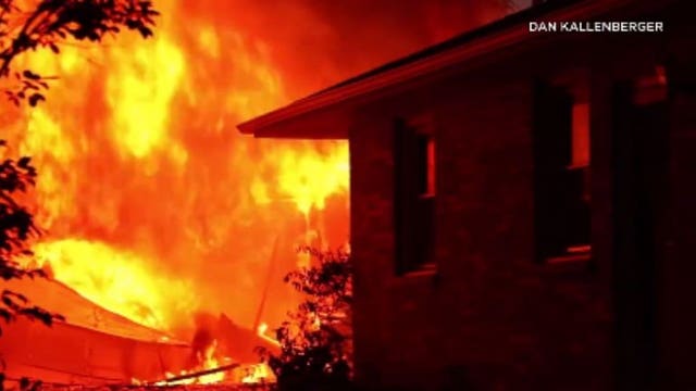 Watch: Firefighters knock down fully-involved blaze impacting garage in West Allis