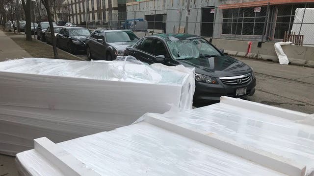 Debris falls multiple stories onto car near Prospect & Ivanhoe