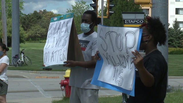 Organized by '60s civil rights activist, protesters gather near 51st and Brown Deer