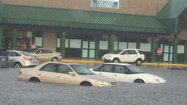 Heavy rain soaks parts of southeast Wisconsin, submerges cars in St. Francis