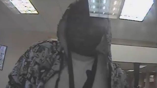 Video: Police seek suspect after armed robbery at Pyramax Bank near 16th and Mitchell