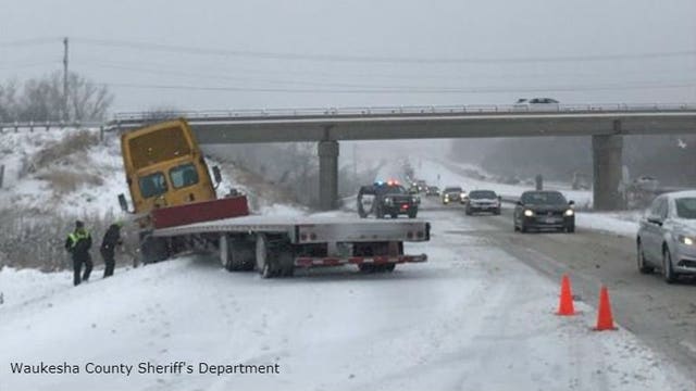 Fresh snowfall leads to multiple crashes, at least 2 jackknifed semis