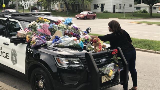 'It's emotional:' Memorials grow across Milwaukee for fallen officer Charles Irvine