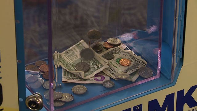 4 donation boxes installed at Mitchell Airport, where you can donate spare change to help the homeless