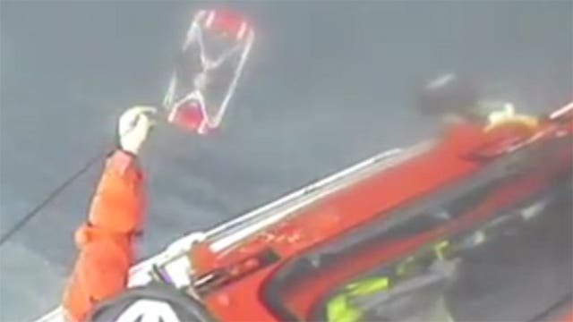 VIDEO: On a mission to cross Lake Michigan, kayaker rescued by U.S. Coast Guard