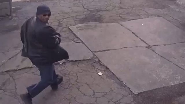 Caught on camera: Suspect armed with tire iron robs Peters Dry Cleaners