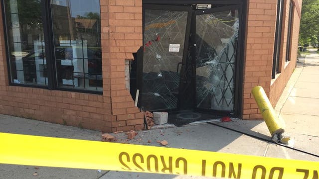 Vehicle smashes into Bouchard's storefront in Milwaukee, shots fired