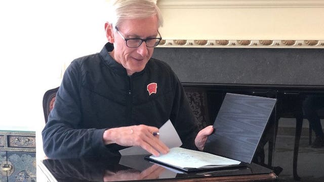 'My pen has been waiting for weeks:' Gov. Evers signs Wisconsin coronavirus relief legislation