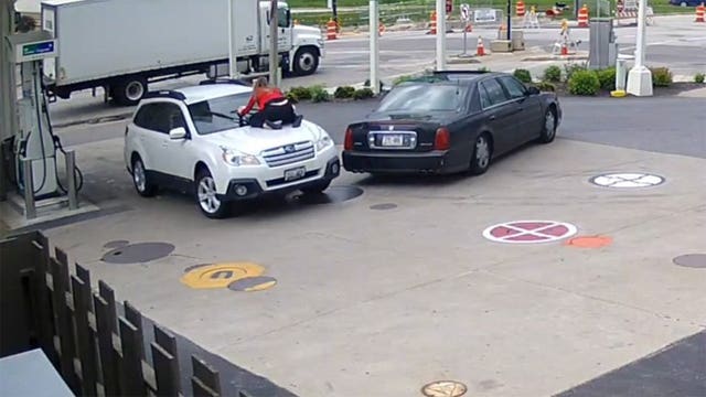Woman jumps on hood, clings to windshield wiper in attempted carjacking caught on video