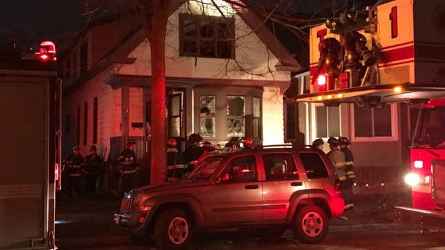 7 adults, 4 children, a dog displaced after fire near 33rd and National; 1 person detained