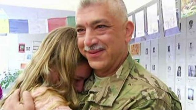 Air Force sergeant surprises his daughter after tour in Afghanistan