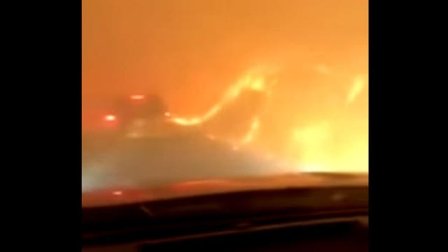 'You did it!' Dad sings, keeps daughter calm as they flee deadly wildfire