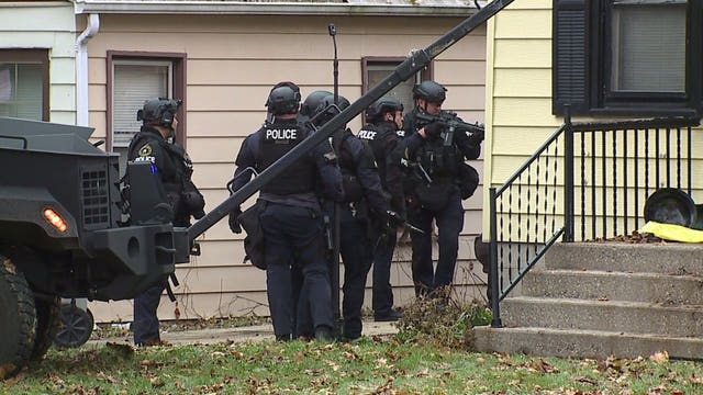 Tactical officers surround home near 38th and Florist: 'Never seen that much police drama there'