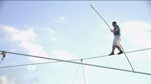 Nik Wallenda to complete longest wire walk ever over Milwaukee Mile: "The wire's where I feel at home"