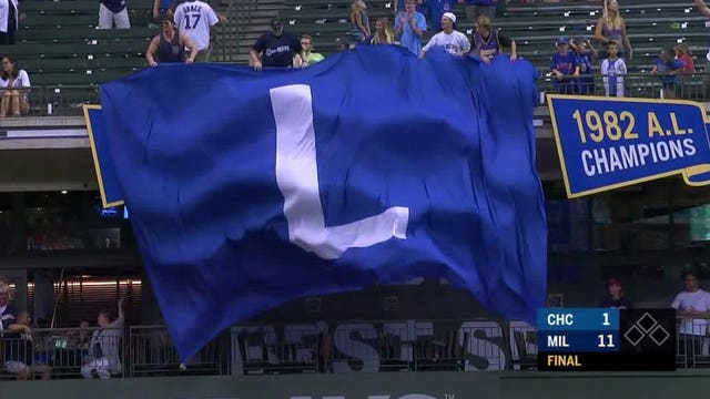 Brewers fan flies giant 'L' flag at Miller Park; 'Cost about the same as an autographed Cole Hamels baseball'