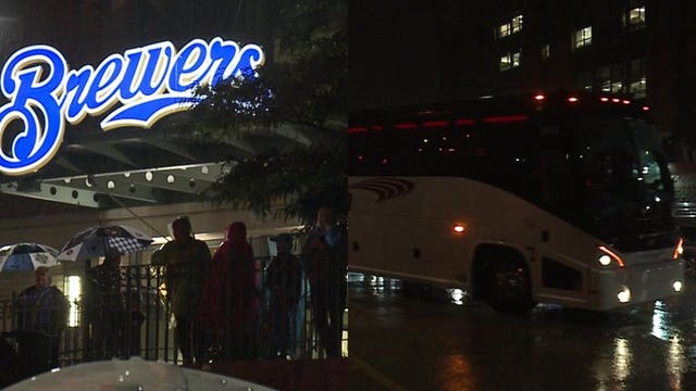 'It's fabulous:' Die-hard fans stand in rain to welcome Brewers home from Wrigley