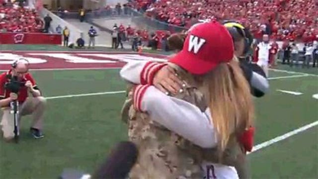 Army Captain surprises her daughter at Wisconsin game