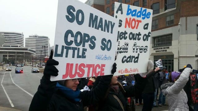 "Maybe we can have peace in the cities that we live in:" Protesters march downtown for Dontre