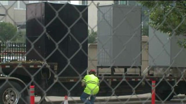 Two generators unloaded to serve as power source for Courthouse