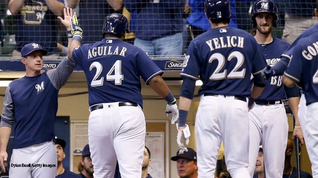 Gonzalez, Aguilar lead Brewers to 7-0 win over Reds