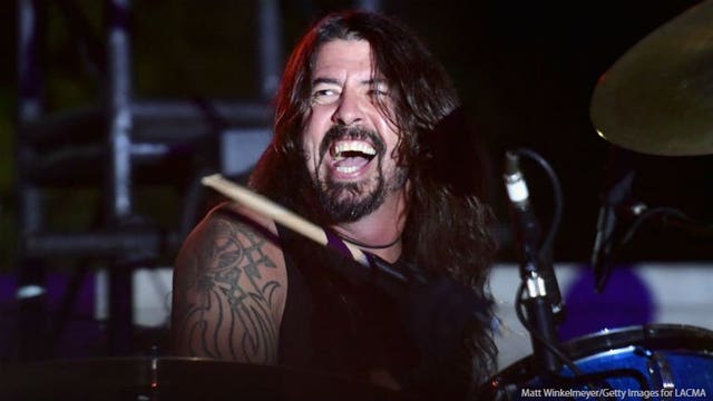 Foo Fighters' Dave Grohl serves BBQ to wildfire firefighters