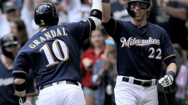 Grandal hits first lead-off HR, Brewers beat Reds 6-5