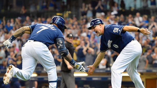 Brewers slip past Pirates 2-1 on Thames' homer in 8th